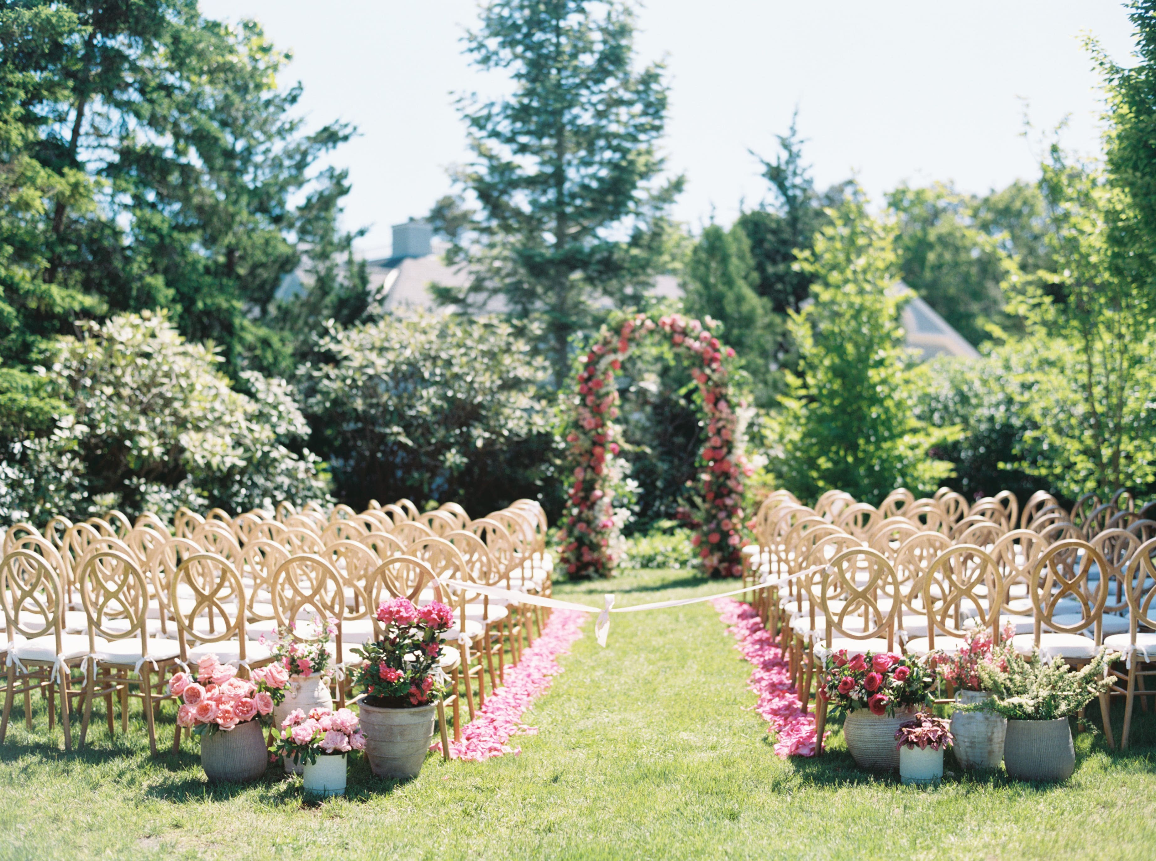 Sustainable wedding setup with reused floral arrangements